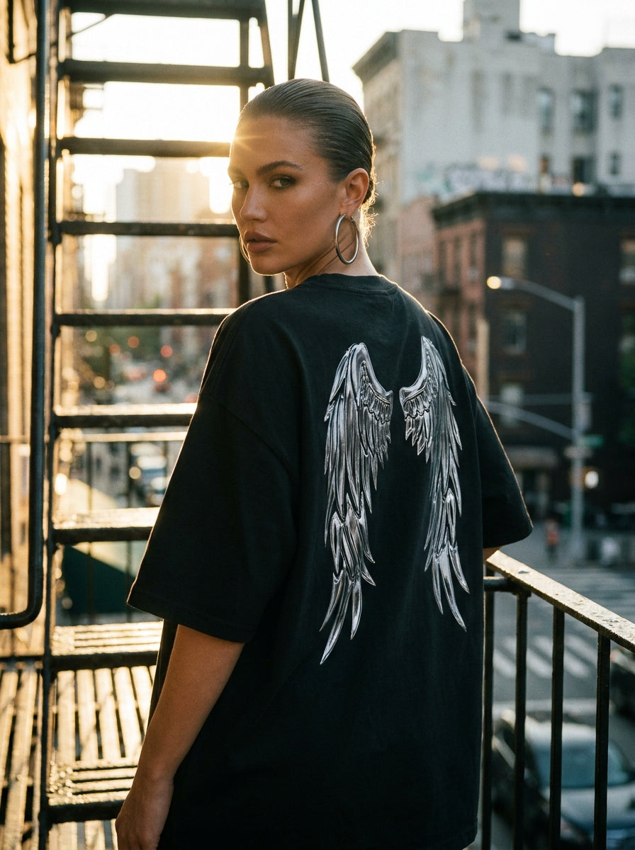 CARRI Chrome Wing Tee — NYC fire escape editorial